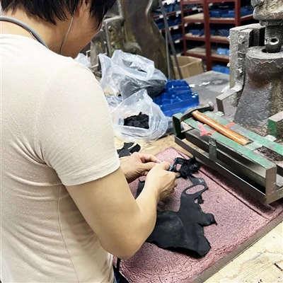 Workers Precisely Cutting Materials To Meet Custom Orders